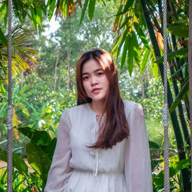 Kaveri Mehta, Lead Design Curator at Valenest Roam, reviewing corporate floral arrangements